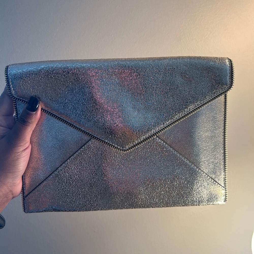 Rebecca Minkoff “Leo” gold clutch